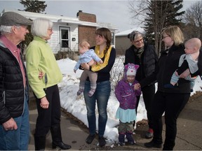 Harry and Jan Kuperus, Cheryl Jansen van Rensburg holding Lidia (9 months), Nina  Domning  with Audrey Hayward behind her, and, Caryn Domning holding  Fritz all participating in the Abundant Communities Initiative. File photo.