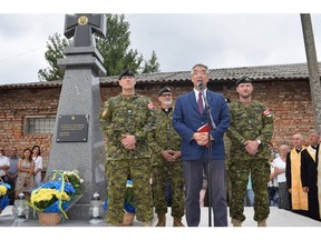 Roman Waschuk, Canada's Ambassador to Ukraine, along with members of the Canadian Forces honour members of the Organization of Ukrainian Nationalists and the Ukrainian Insurgent Army. Photo via Sambir town Facebook page.