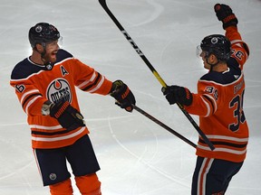 Edmonton Oilers Alex Chiasson (39) celebrates his goal with Adam Larsson (6) against the Calgary Flames during pre-season NHL action at Rogers Place in Edmonton, September 20, 2019. Ed Kaiser/Postmedia