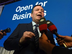 Premier Jason Kenney talks to the media after speaking at a news conference being held by TELUS, which announced a landmark investment in Alberta over the next five years, at the Art Gallery of Alberta in Edmonton, Sept. 24, 2019.