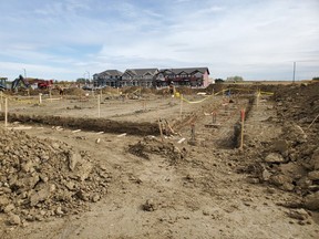 The Divine Mercy Catholic School Construction site in the Orchards had unforeseen ground problems, revealed in October, that prompted the Edmonton Catholic school board to spend an extra $1.4 million fortifying the school's foundation and $1.3 million to keep construction on schedule.