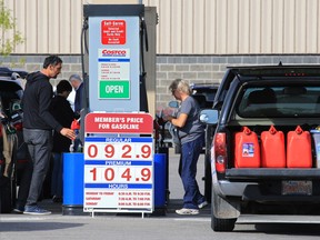 Customers fill up on fuel at the Costco in Deerfoot Meadows, Calgary, on Sept. 16, 2019 after word of the attacks on Saudi oil facilities.