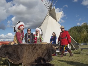 Chief Isaac Ausinis Laboucan-Avirom of the Woodland Cree First Nation signs the treaty. Buffalo Treaty signing hosted by the Samson Cree Nation and in partnership with the Wildlife Conservation Society on September 19, 2019. The goal of the treaty is to restore buffalo to the traditional First Nations lands on the prairies. Photo by Shaughn Butts / Postmedia