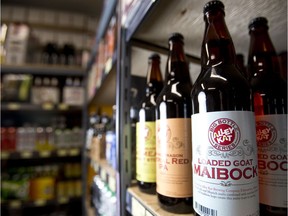 Beer from Alberta breweries, including Alley Kat Loaded Goat Maibock, is seen in Sherbrooke Liquor Store's beer cooler at their 11819 St. Albert Trial location in Edmonton, Alta., on Wednesday, May 14, 2014. The store carries a wide selection of craft beers, including local and house brands. Ian Kucerak/Edmonton Sun/QMI Agency