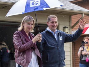 Federal Conservative leader Andrew Scheer and his wife Jill leave a campaign announcement in Surrey, B.C. on Sunday, September 15, 2019.