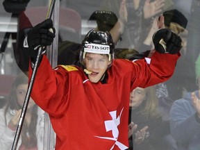 Swiss player Gaetan Haas celebrates his first period goal during relegation action at the 2012 IIHF World Junior Hockey Championships between Switzerland and USA in Calgary on Jan. 4, 2012.