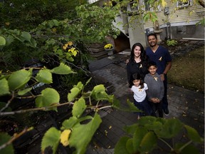 Michelle Goswami, Ashim Goswami, Naveed Goswami, 9, and Veda Goswami, 7, pose for a photo outside the Kids with Cancer Society House, 11135 84 Ave., in Edmonton Tuesday Sept. 17, 2019. Naveed is a survivor of acute lymphoblastic leukemia. On Tuesday Go Auto announced a $3 million donation to the Kids with Cancer Society. Photo by David Bloom