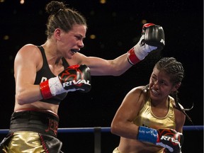 Jelena Mrdjenovich (left) fights Marisol Corona during KO 87, in Edmonton Friday Sept. 13, 2019.