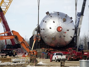 Crews work on the polypropylene reactor at the Heartland Petrochemical Complex, 55436 Range Road 220, in Fort Saskatchewan Thursday March 7, 2019. The reactor converts propylene into polypropylene resin. The resin is then kneaded into polypropylene pellets (the finished product) at the complex. On Thursday the Federal government announced investment in Alberta petrochemical innovation, during a press conference at the complex. Photo by David Bloom