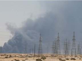 Smoke is seen following a fire at an Aramco factory in Abqaiq, Saudi Arabia, on Sept. 14, 2019.