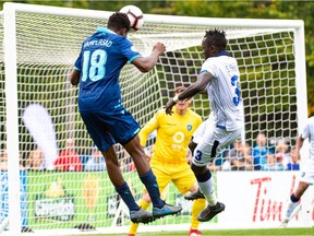 Halifax Wanderers FC midfielder Andre Rampersad (18) tries to head the ball into the goal from a corner kick on Wanderers Field in Halifax on Monday, Sept. 2, 2019.