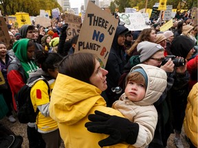 Students and supporters rally during the Global Climate Strike at the Alberta legislature in Edmonton on Friday, Sept. 27, 2019. Thousands of students across the country joined together to call for action on climate change.