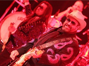 The Mavericks' Raul Malo, right, and guitarist Eddie Perez at Winspear Wednesday night.