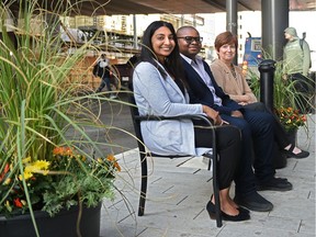 From the left, the city of Edmonton's Nicole Numes and Sam Juru sit alongside Susan Mancini of Oxford Properties.