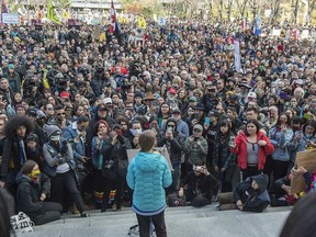 Swedish climate activist Greta Thunberg, in blue jacket, joined about 8,000 Edmonton youth, climate activists, and community members outside the Alberta legislature in a climate strike on Friday, Oct. 18.