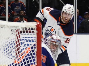 James Neal of the Edmonton Oilers scores on the power-play against Semyon Varlamov of the New York Islanders  at Nassau Coliseum on Oct. 8, 2019.