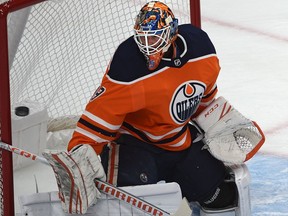 Edmonton Oilers goalie Mikko Koskinen makes a save against the Vancouver Canucks on Sept. 19, 2019, during NHL pre-season action at Rogers Place.