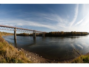 The Capilano Footbridge is seen surrounded by fall foilage in Edmonton, on Tuesday, Oct. 1, 2019. Photo by Ian Kucerak/Postmedia