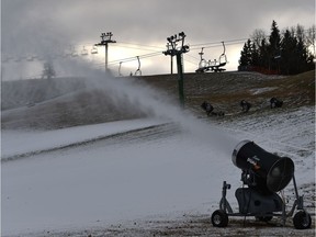 The Snow Valley Ski Hill is starting to make snow with one of its snow making machines as the chairlifts in back sit idle for the moment in Edmonton, October 28, 2019.