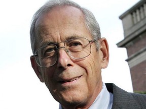 In this file photo taken on September 22, 2005 then 2005 Crafoord Prize winner Professor P. James E. Peebles of Princeton University poses outside the Royal Academy of Sciences in Stockholm.