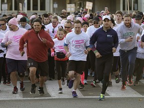 Hundreds of people participated in the 2019 Run for the Cure at the Alberta Legislature grounds in Edmonton on Sunday October 6, 2019. The run is the largest, single-day, volunteer-led event dedicated to raising funds for breast cancer research, support programs, health education and advocacy initiatives. (PHOTO BY LARRY WONG/POSTMEDIA)