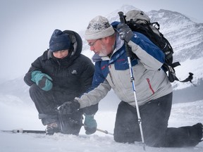 Climate activist Greta Thunberg, left, and John Pomeroy, director of the Global Water Futures program at the University of Saskatchewan, are shown during a visit to the Athabasca Glacier in Jasper National Park in this recent handout photo.