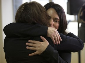 (Left to right) Adeara Recovery Centre for Women executive director Lori Patrick hugs current client Jocelan Yeomans following a press conference where the Province announced $20 million over four years to expand drug treatment courts.