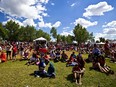 People take in cultural performances during Canada Day celebrations at Mill Woods Park in Edmonton, Alta., on Tuesday, July 1, 2014. Codie McLachlan/Edmonton Sun/QMI Agency