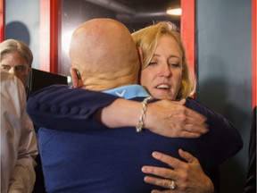 Lisa Raitt, federal Progressive Conservative candidate for Milton, loses her seat to Liberal candidate Adam van Koeverden, in the  2019 federal election as she hugs supporters at EddieO's PourHouse & Kitchen in Milton, Ont. on Monday Oct. 21, 2019.