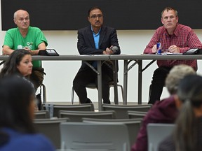 About 20 people attended a forum as federal candidates on the debating panel, from left, Michael Kalmanovitch, (Green Party), Amarjeet Sohi, (Liberals), and Mark Cherrington, (NDP),  discussed issues of affordable (non-market) housing and homelessness hosted by the Edmonton Coalition on Housing and Homelessness (ECOHH) at NorQuest College in Edmonton, Monday, Oct. 7, 2019.