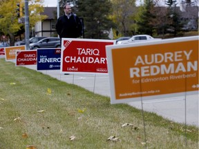 Candidate signs dot the side of the roadway in Edmonton Riverbend in advance of the Oct. 21, 2019, federal election.