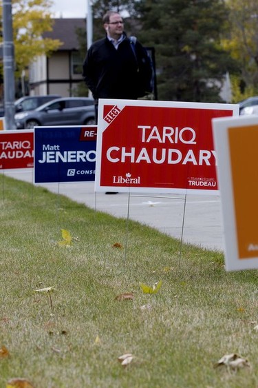 Candidate signs dot the side of the roadway in Edmonton Riverbend in advance of the Monday, Oct. 21, 2019, federal election. Polls open at 7:30 a.m. and close at 7:30 p.m. in all Edmonton and area ridings.