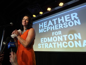 NDP supporters watch results at Edmonton-Strathcona NDP candidate Heather McPherson's election event at the Grindstone Theatre, 10019 81 Ave. Photo by David Bloom