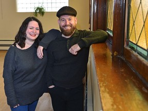 Matthew MacKenzie, artistic director, and Sheiny Satanove, producer at Punctuate! pose in their rehearsal space at Holy Trinity Anglican Church.