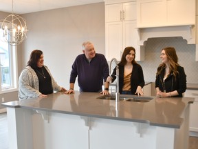 Alannah Muirhead and her husband, Greg, with daughters Kate, 16, and Grace, 20, are looking forward to moving into their new home by Marcson Homes.