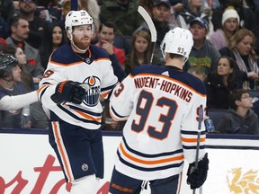 CP-Web. Edmonton Oilers' James Neal, left, celebrates his goal against the Columbus Blue Jackets with teammate Ryan Nugent-Hopkins during the first period of an NHL hockey game Wednesday, Oct. 30, 2019, in Columbus, Ohio.