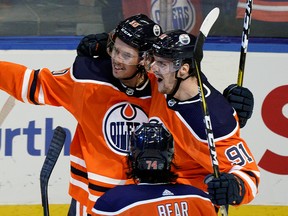 Edmonton Oilers Joakim Nygard celebrates his goal with team mates Gaetan Haas (right) and Ethan Bear (front) during third period NHL game action against the Los Angeles Kings in Edmonton on Saturday October 5, 2019. (PHOTO BY LARRY WONG/POSTMEDIA)