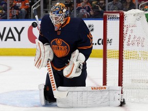 Edmonton Oilers goalie Mikko Koskinen makes a save against the Detroit Red Wings during NHL action on Oct. 18, 2019, at Rogers Place.