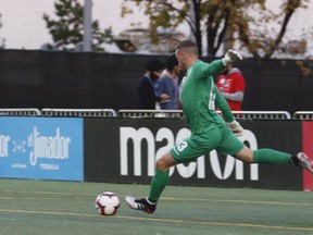 FC Edmonton goalkeeper Dylon Powley takes a goal kick in a Canadian Premier League game against Forge FC at Clarke Field on Wednesday, Oct. 2, 2019.