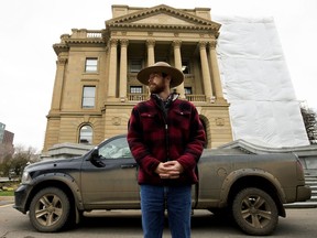 Alberta Grazing Leaseholders Association chairman Kyle Forbes with his truck outside the Alberta legislature after attending a news conference where Environment and Parks Minister Jason Nixon announced the Public Lands Modernization Amendment Act on Tuesday, Oct. 15, 2019.