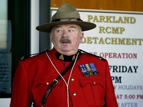 Parkland RCMP Staff Sgt. Ian Gillan stands on guard at the entrance of the new Parkland RCMP detachment in Spruce Grove, Alberta, which held its grand opening on October 11, 2019. (PHOTO BY LARRY WONG/POSTMEDIA)