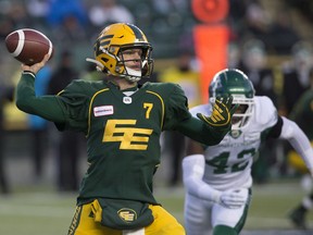 The Edmonton Eskimos' quarterback Trevor Harris (7) battles the Saskatchewan Roughriders during first half CFL action at Commonwealth Stadium in Edmonton Saturday Oct. 26, 2019.