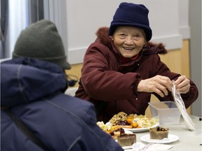 Edmontonians take part in the Bissell Centre Thanksgiving Dinner, in Edmonton Thursday Oct. 10, 2019. The centre expected to serve approximately 400 meals. Photo by David Bloom