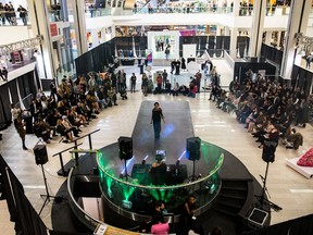 A model walks the runway during the VOGUE fashion show at West Edmonton Mall on Saturday, Oct. 26.