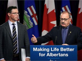 Alberta Transportation Minister Ric McIver (right) and Alberta Minister of Justice and Solicitor General Doug Schweitzer provided an update on photo radar in Alberta at the Alberta Legislature in Edmonton on Tuesday Nov. 26, 2019.