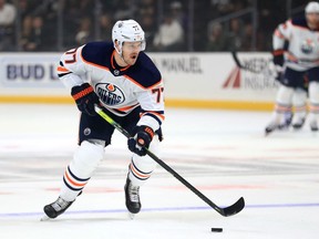 Oscar Klefbom of the Edmonton Oilers skates with the puck during NHL action on Nov. 21, 2019, against the host Los Angeles Kings.