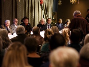 Alberta government Fair Deal Panel members listen to a speaker during a town hall meeting at St. Michael's Heritage Hall in Edmonton, on Tuesday, Dec. 3, 2019. Photo by Ian Kucerak/Postmedia