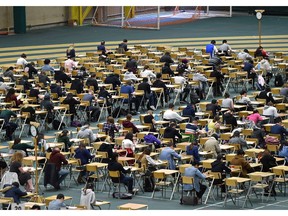 Some empty seats vacated by University of Alberta students who finished writing exams as others still grind away at the Butterdome in Edmonton, April 18, 2019.