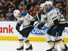 St. Louis Blues' Jaden Schwartz (17) celebrates his goal on Edmonton Oilers' goaltender Mike Smith (41) with teammates during the first period of a NHL hockey game at Rogers Place in Edmonton, on Wednesday, Nov. 6, 2019.