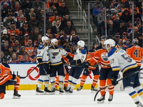 St. Louis Blues' Alex Pietrangelo (27) celebrates a goal with teammates on the Edmonton Oilers during the second period of a NHL hockey game at Rogers Place in Edmonton, on Wednesday, Nov. 6, 2019.